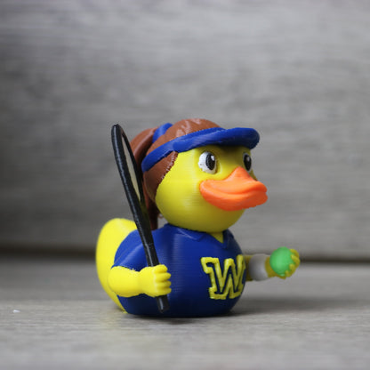 Rubber duck dressed as a tennis player with a blue outfit and 'W' logo on a gray background