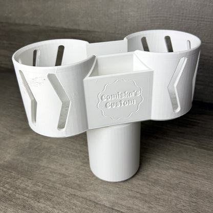 White 3D printed dual cup holder expander with center storage pocket, angled view