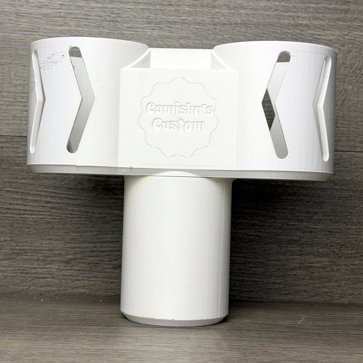 Dual cup holder expander front view showing the base that fits a standard cup holder
