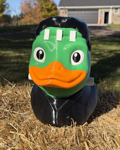 Giant Franken-Duck 3D printed Halloween decor on a hay bale