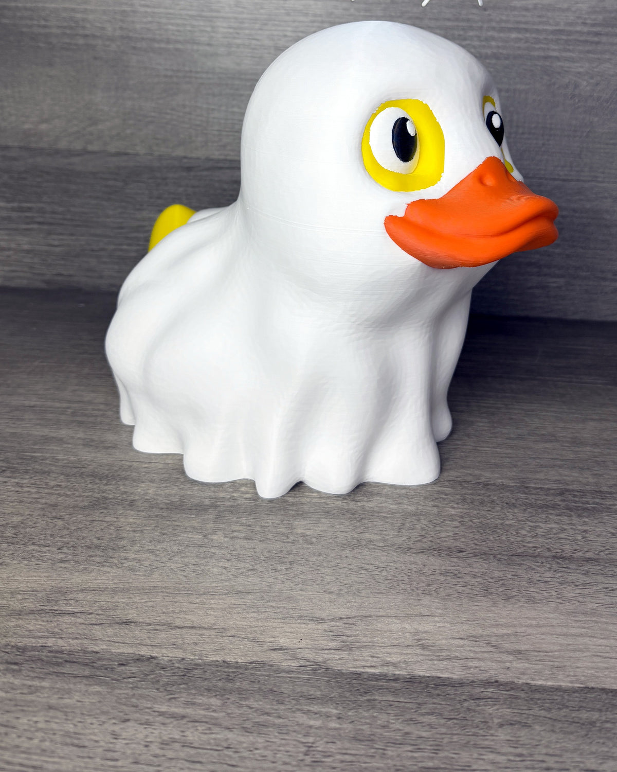 Giant Ghost-Duck three-quarter view showing ghost sheet and tail
