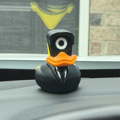 Spy Duck on a car dashboard